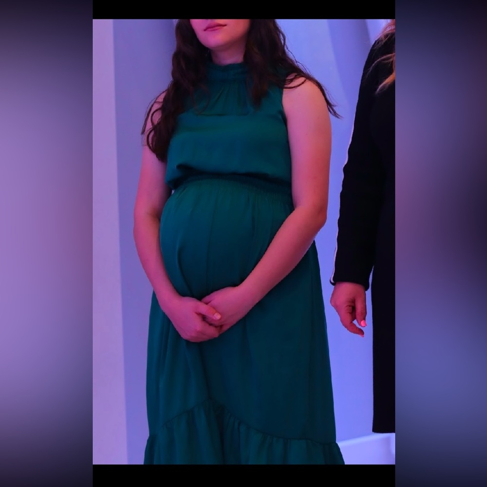 Worn just one time. Excellent condition. Good for pregnants as well.